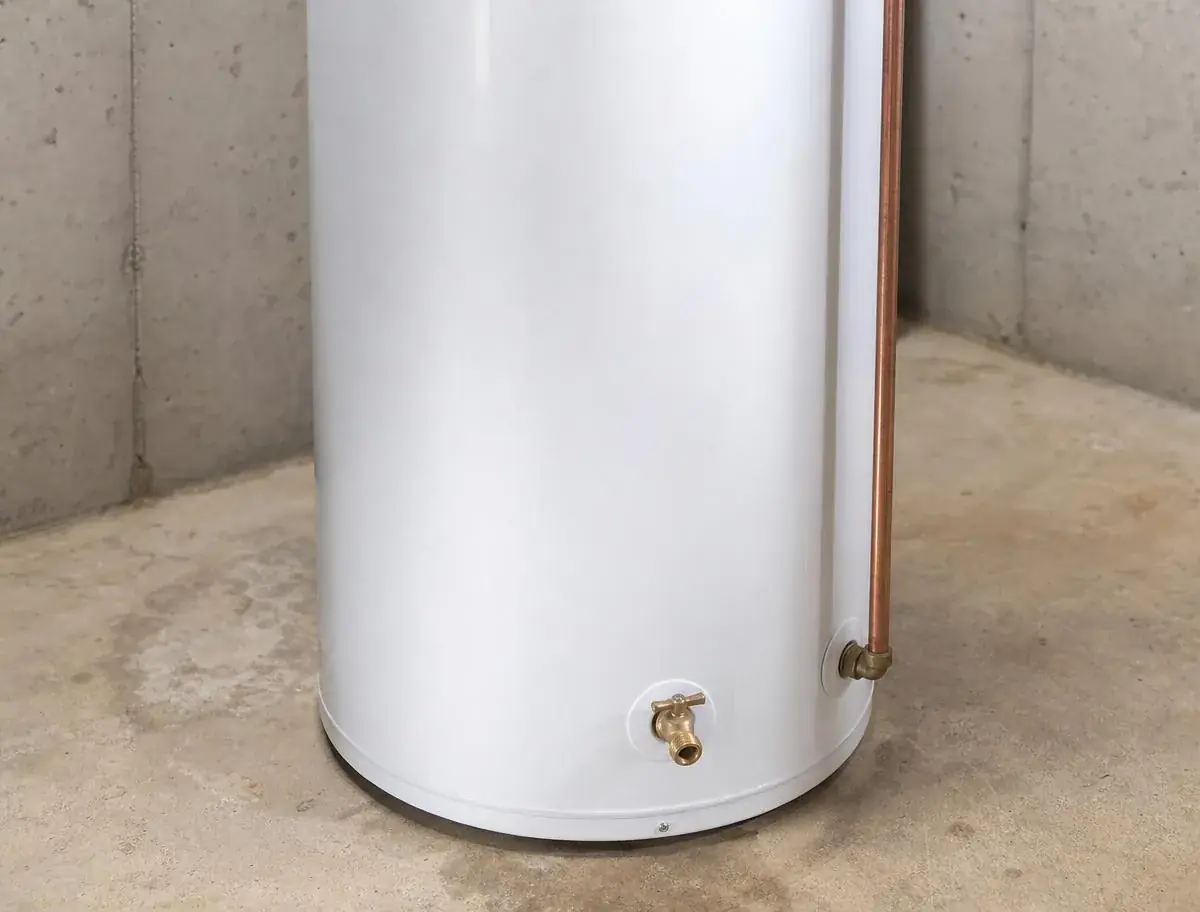 Green Care Energy technician repairing a residential water heater in Toronto